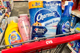 tide simply, loreal elvive shampoo, crest toothpaste, charmin toilet paper, and dawn powerwash in a cart