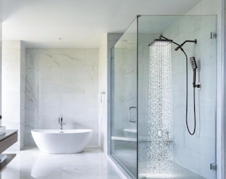 a shower with a rainfall shower head in a bathroom