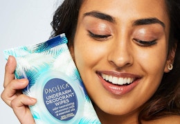 person holding pacifica wipes