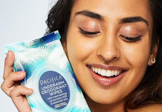 person holding pacifica wipes