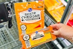 hand holding kroger cheese