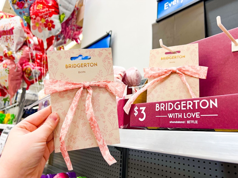 hand holding bridgerton floral bow at walmart