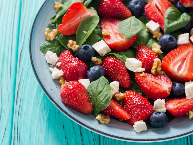 A summer salad in a bowl on a table