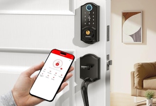 a person using a keyless door lock with their phone