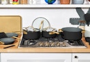 black cookware set on a stovetop
