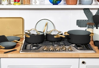 black cookware set on a stovetop