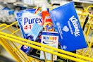 purex, crest, kleenex, tide, icy hot in a dollar general shopping cart