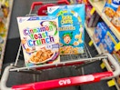 two boxes of General Mills cereal inside cart