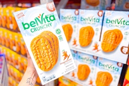 hand holding a box of belvita breakfast biscuits