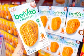 hand holding a box of belvita breakfast biscuits
