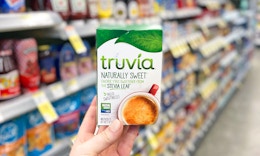 hand holding truvia sweetener walgreens