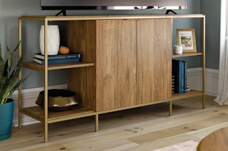 wooden tv stand in a living room