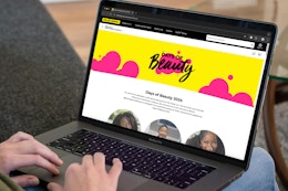 a person on the dollar general website on their macbook