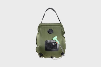 a shower bag on a grey background