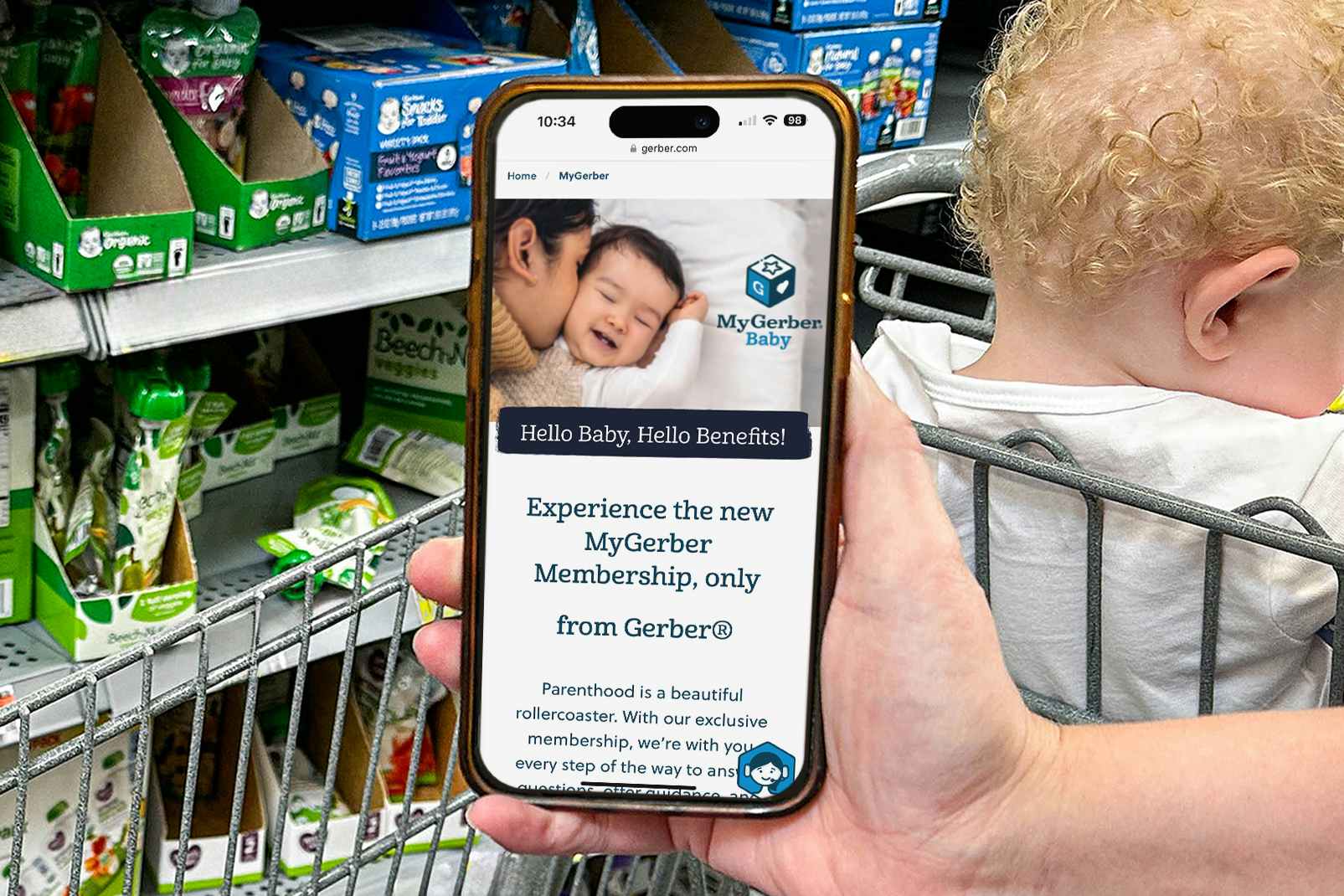 someone holding a phone displaying the my gerber baby website page