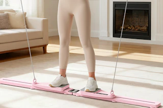 a woman on a pilates board