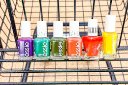 essie nail polish lined up in shopping cart