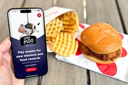 code moo on phone next to some chick-fil-a