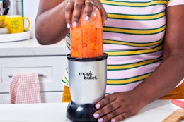 Magic Bullet Blender, Small, Silver, 11 Piece Set on a counter top.