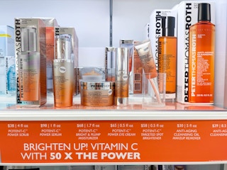 skincare products on an orange shelf