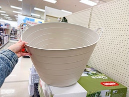 hand grabbing a brightroom storage tub off a target shelf