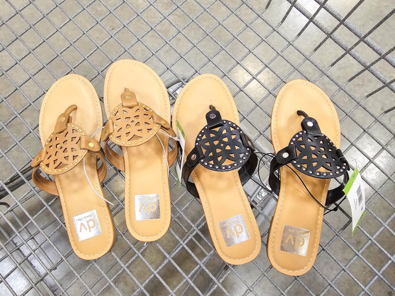 2 pairs of sandals in a cart