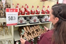 a person shopping 50 percent off christmas decor in hobby lobby
