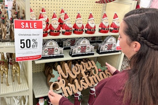 a person shopping 50 percent off christmas decor in hobby lobby