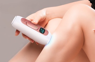 A person using an IPL on their legs