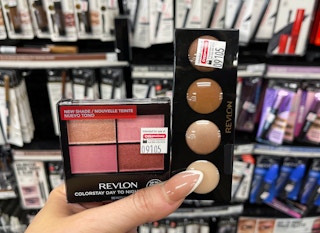 revlon eye cosmetics held in hand