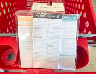 three to do list pads stacked in a target shopping cart
