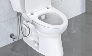a bidet on a toilet 