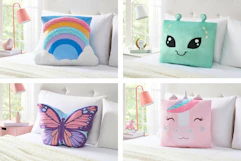 4 lifestyle photos of Your Zone Snuggly Pillows (rainbow, alien, butterfly & unicorn)