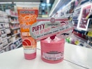 a bundle of soap and glory items sitting on a display at a store.