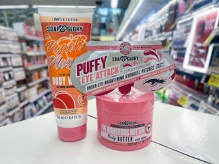 a bundle of soap and glory items sitting on a display at a store.