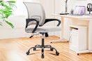 Lifestyle image of the JONPONY Office Chair in the color "gray" in office like setting