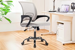 Lifestyle image of the JONPONY Office Chair in the color "gray" in office like setting