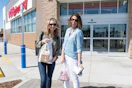 Joanie and Heather standing outside a CVS pharmacy.