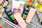 pantene, tresemme, and monday shampoo in a cart