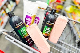 pantene, tresemme, and monday shampoo in a cart