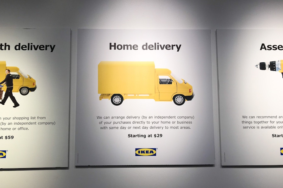 a sign for home delivery at the IKEA store