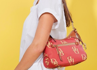 woman carrying purse