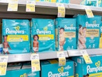 pampers diapers packs on walgreens shelf