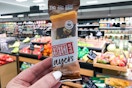 hand holding a perfect bar layers bar at target