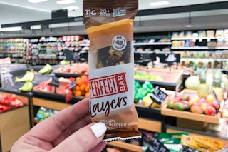 hand holding a perfect bar layers bar at target