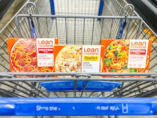 three packages of Lean Cuisine meals in a Walmart cart