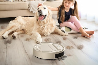 Lefant Pro Robot Vacuum Cleaner vacuuming in front of a girl and a dog
