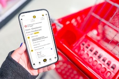 hand holding smartphone with kcl app and showing 1-clip deal next to red shopping cart