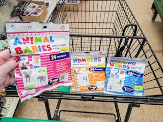 match & learn puzzles in a cart