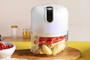 LVSENLIN 250ML Electric Garlic Chopper sitting on a kitchen countertop.